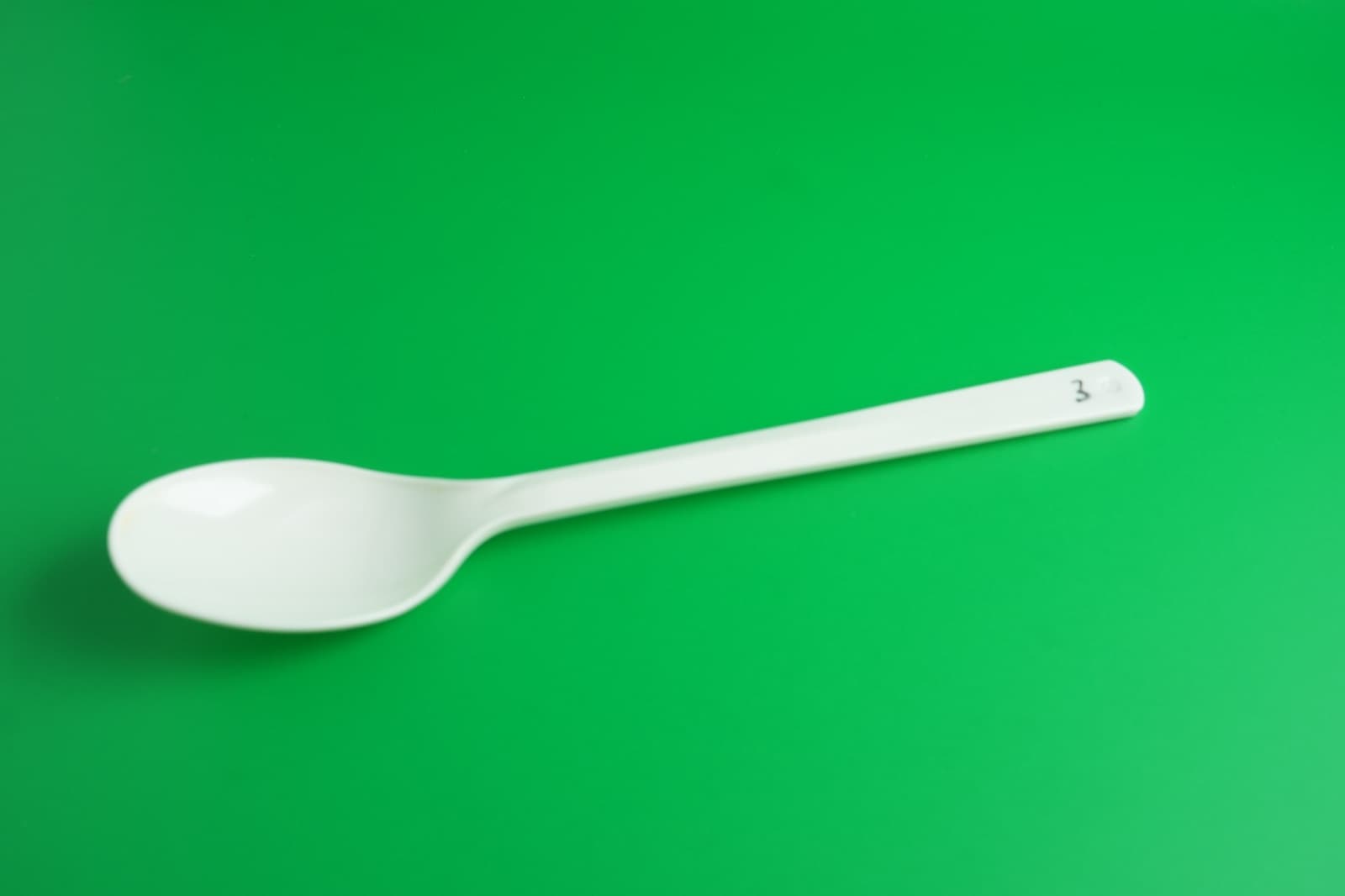 Unknown plastic spoon